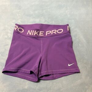 Nike Pro’s purple